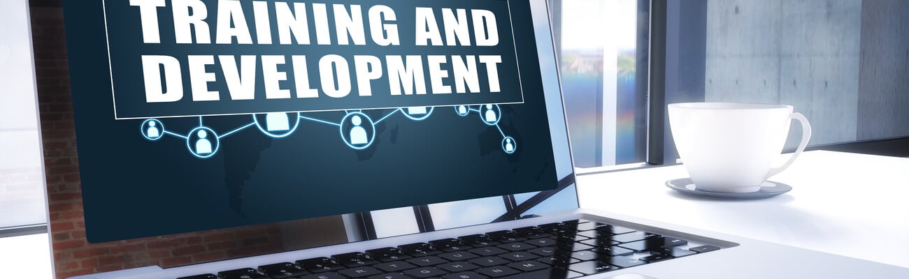 Training and Development text on modern laptop screen in office environment. 3D render illustration business text concept.; Shutterstock ID 1014635968
