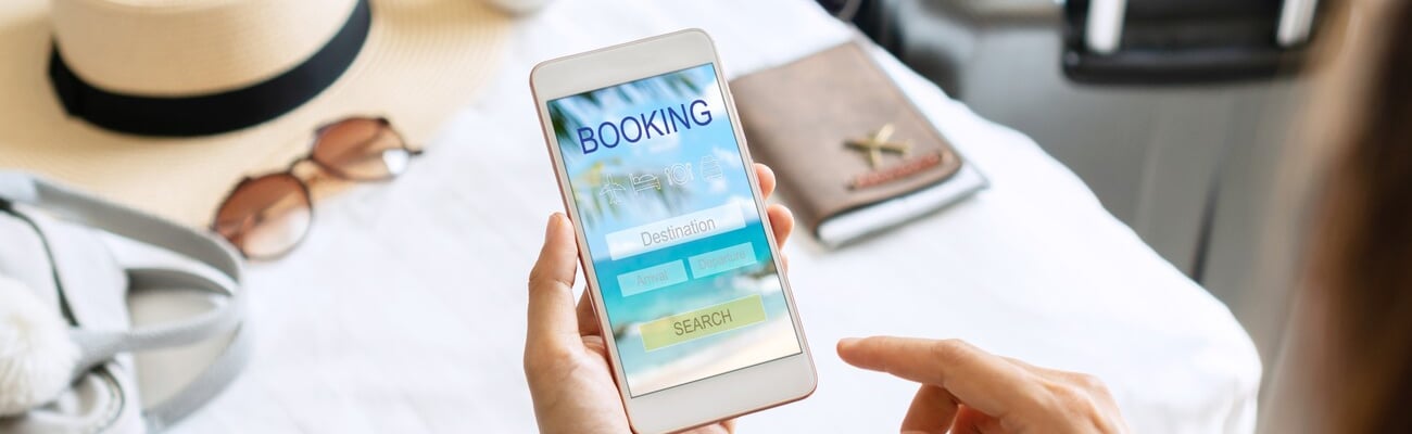 Woman search ticket reservation for holiday. Girl using travel application for flight tickets and hotel room online booking. Online travel agency hotel flight ticket booking, travel planning concept.; Shutterstock ID 2190537405