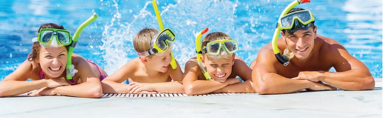 Family at a hotel pool