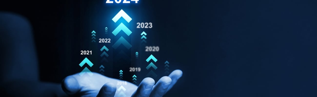 hand with digital years leading up to 2024