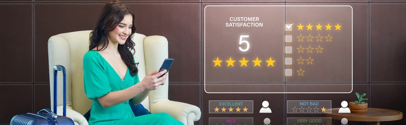 woman rating hotel via smartphone app