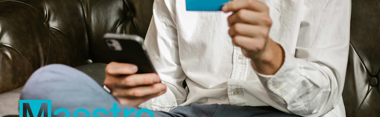 person using credit card on phone