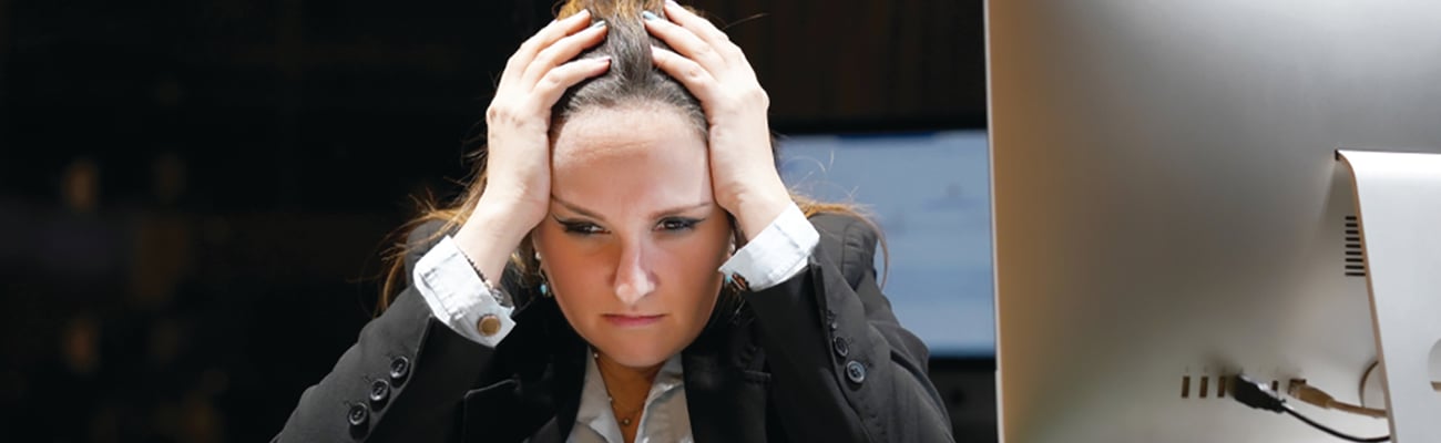 unhappy front desk agent at a hotel