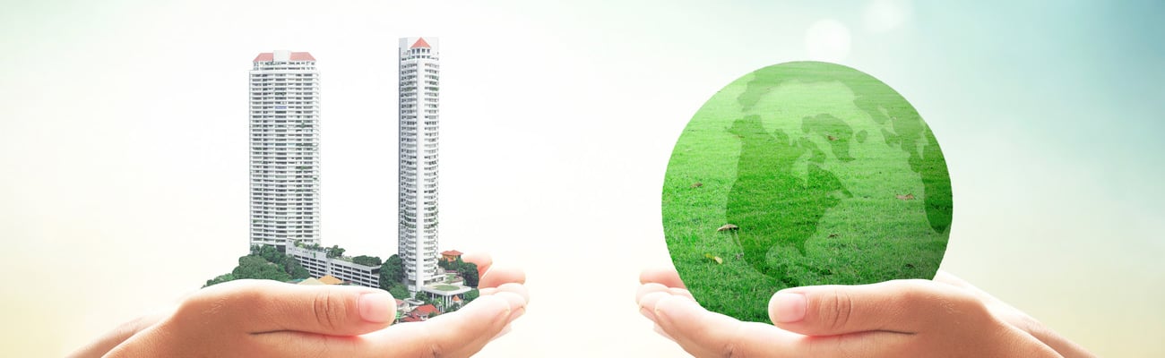 World environment day concept: Two human hands holding big tower and earth globe of grass over blurred nature background; Shutterstock ID 330667763