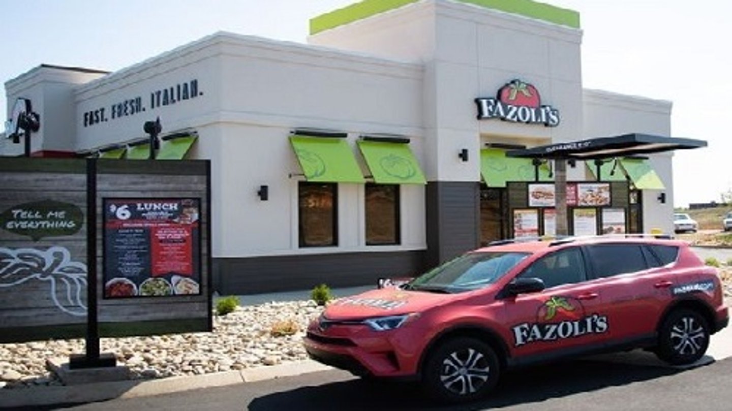 a car parked in front of a building