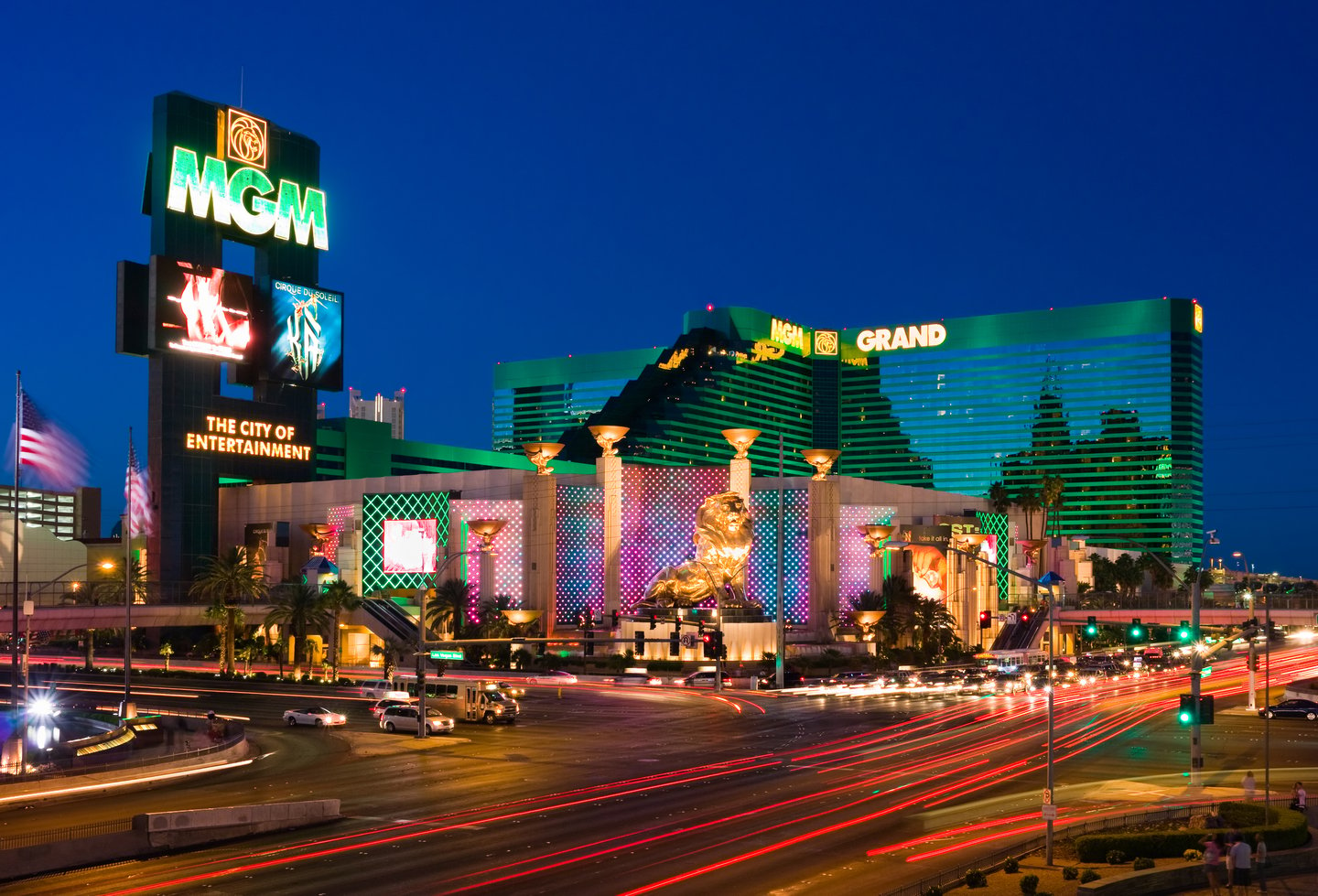 a lit up city at night with MGM Grand Las Vegas in the background