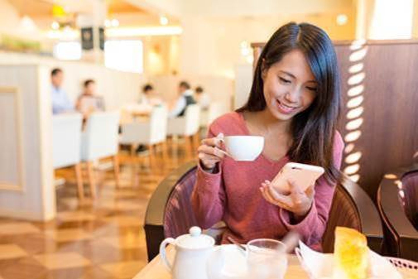 a woman sitting at a table