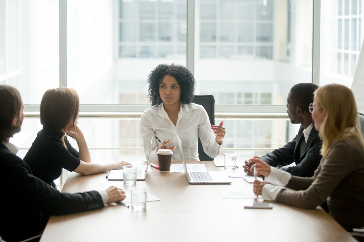 a group of people sitting at a table