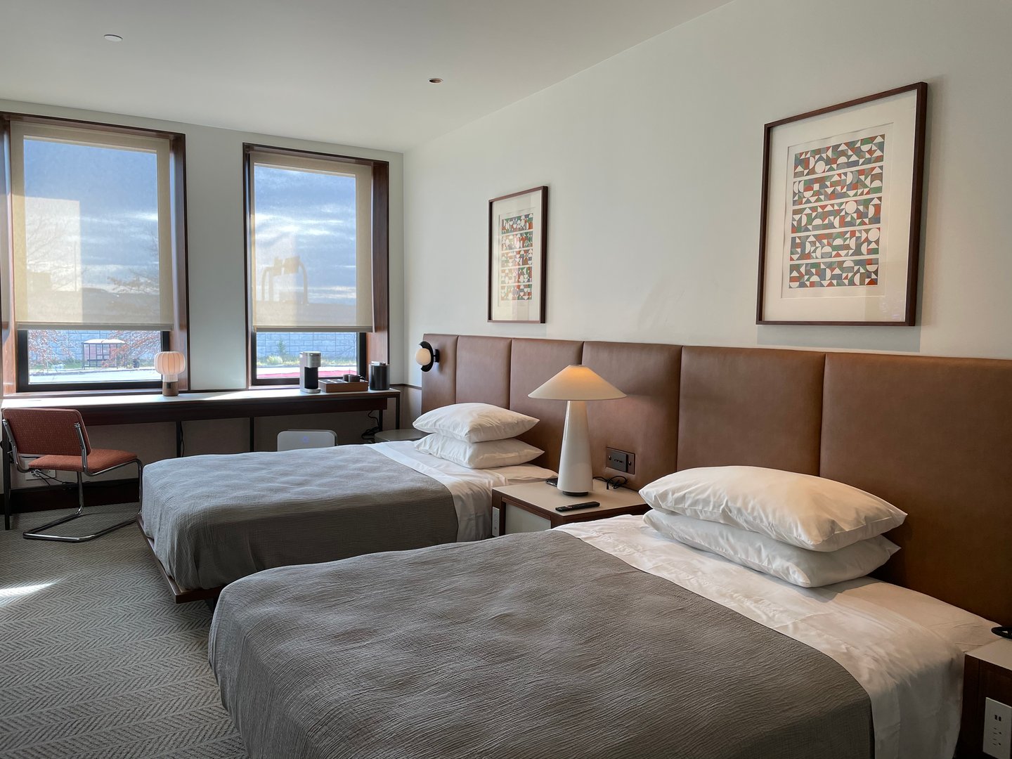 a bedroom with a large bed in a hotel room