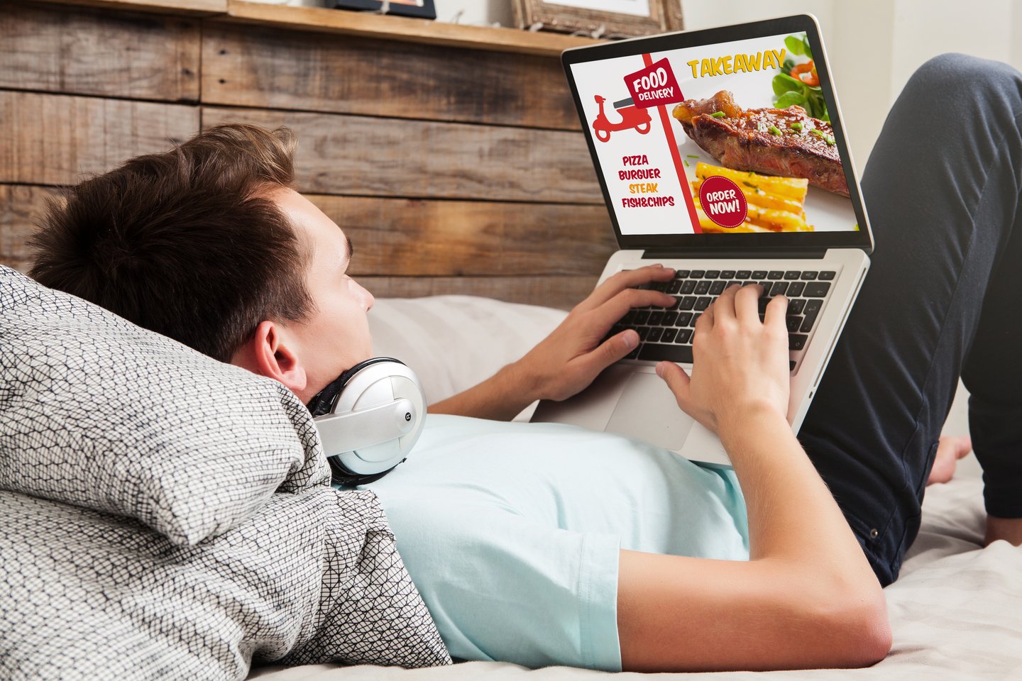 a man sitting on a bed