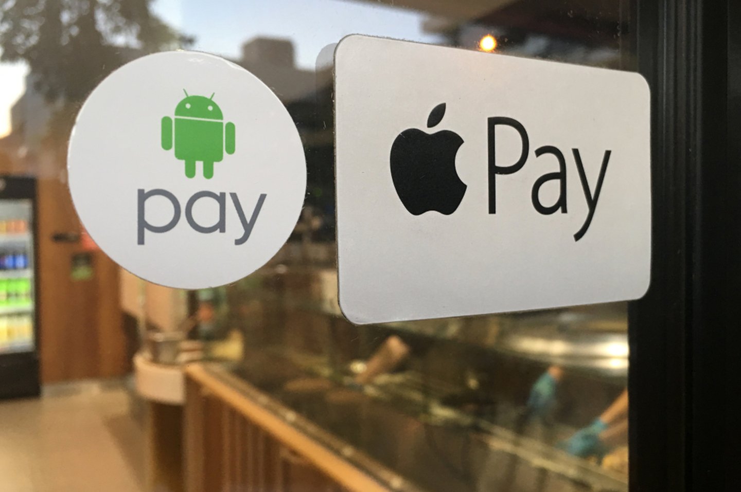 apple pay and android pay logos