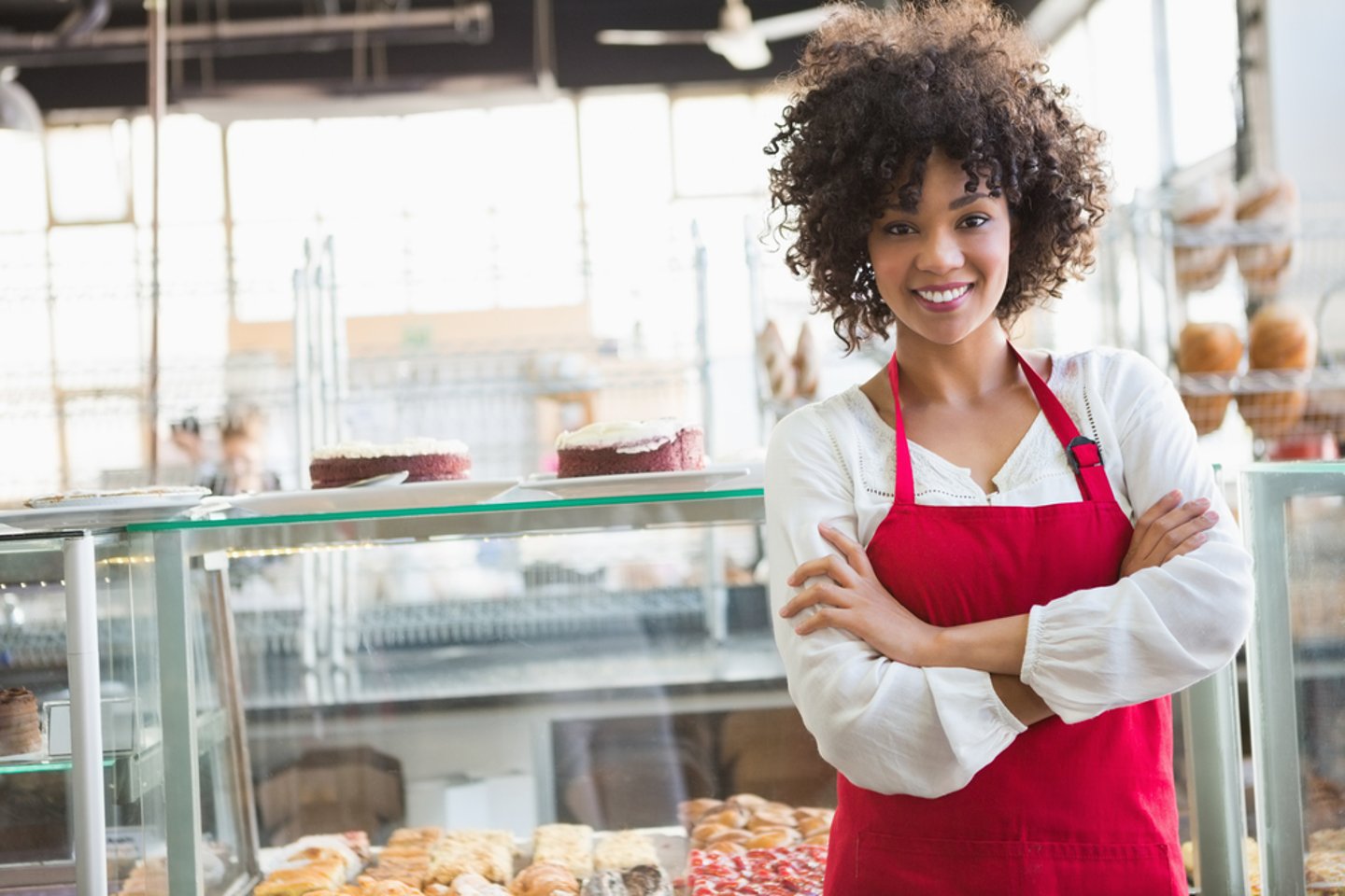 Female bakery worker smiling