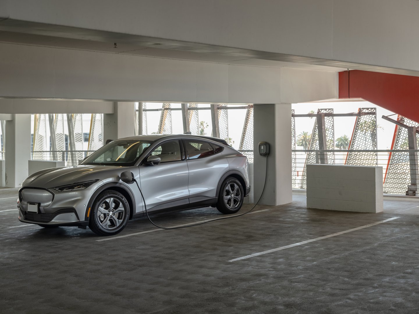 Car in parking garage using EVPassport tech