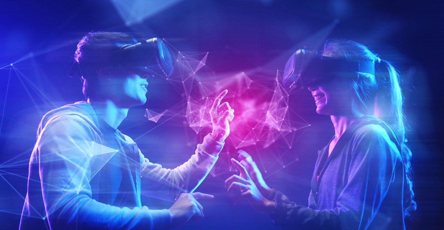 two people wearing VR headsets