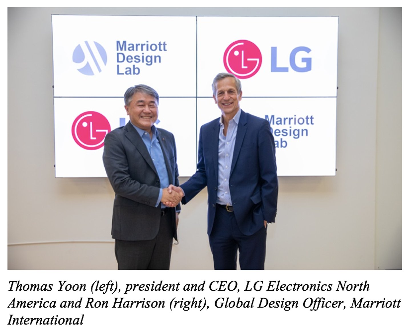 Thomas Yoon of LG and Ron Harrison of Marriott Shaking hands