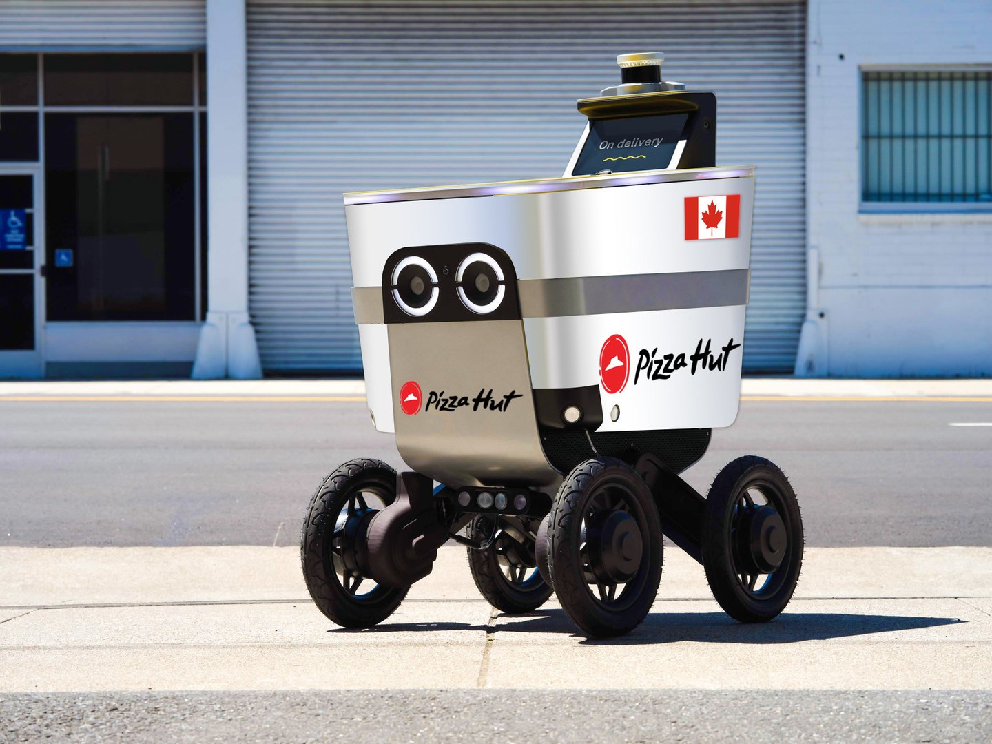 robot delivering Pizza Hut pizza