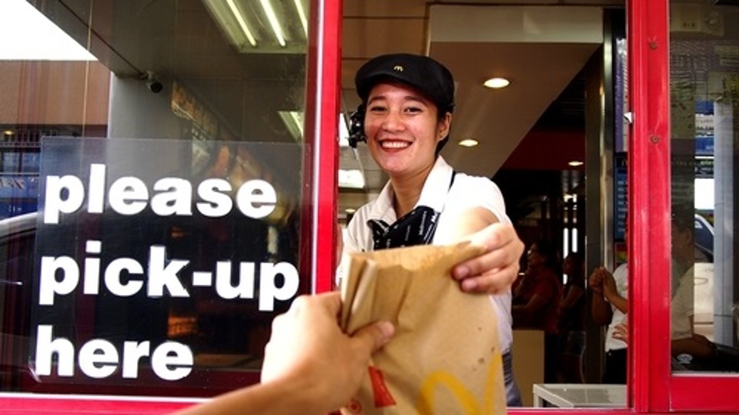 a person standing in front of a store