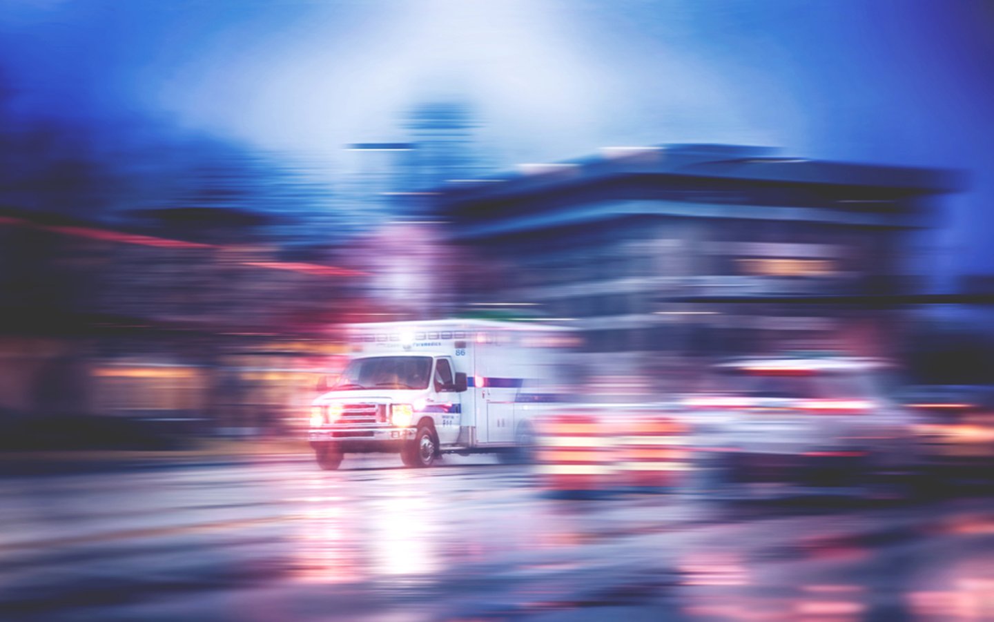 a blurry photo of an ambulance