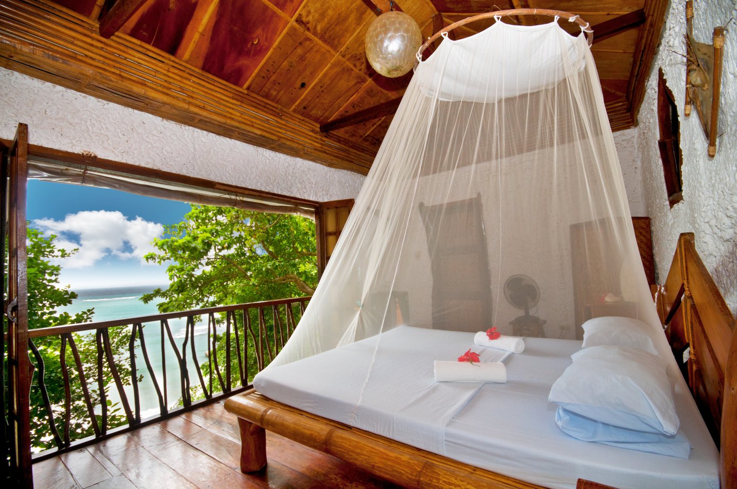 Resort Guest Room with Mosquito net over the bed