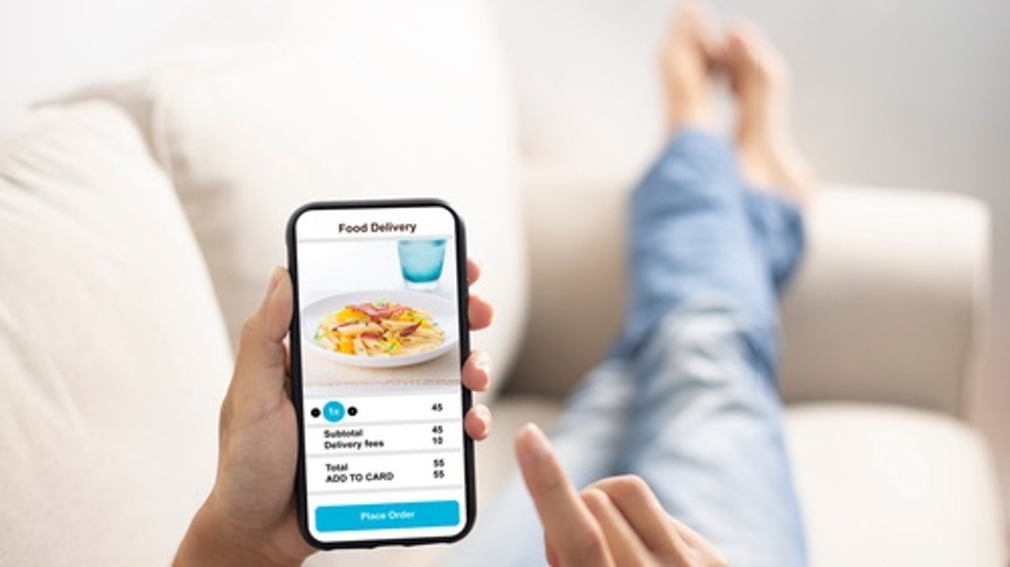 online ordering mobile app feet on a couch