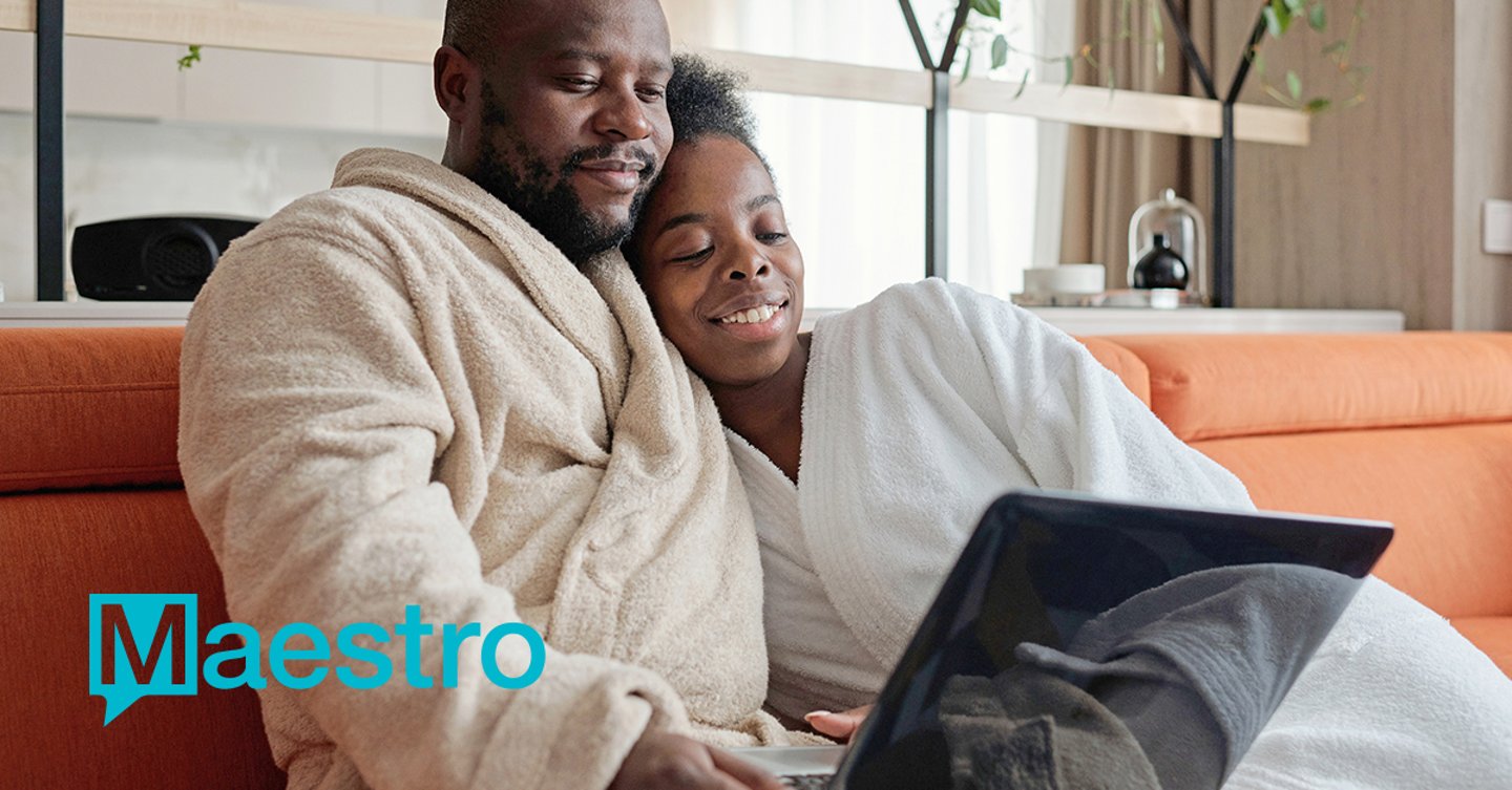 man, woman, looking at a tablet