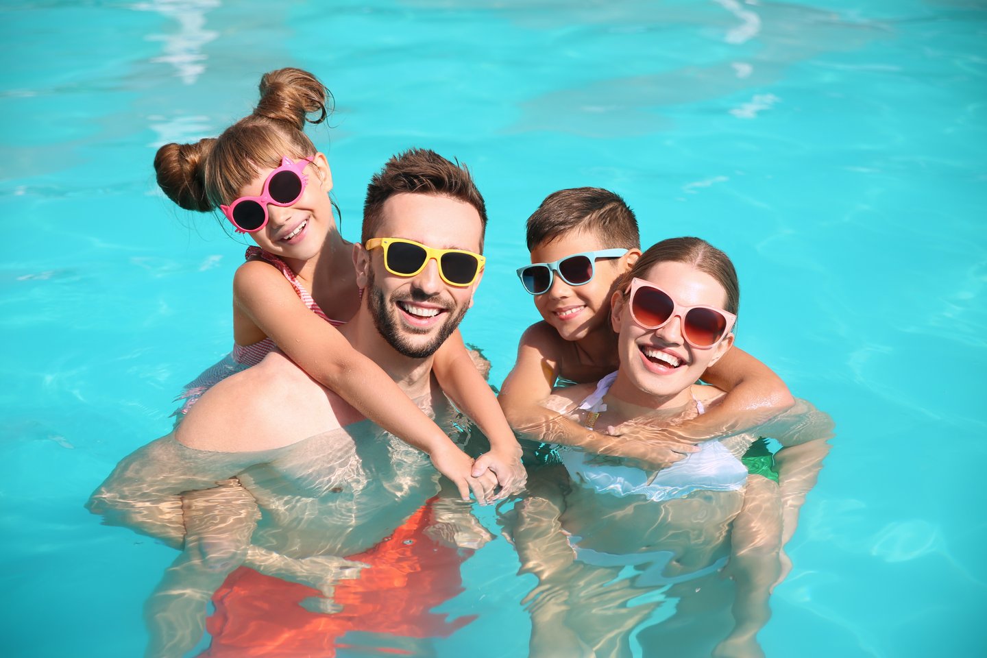 family in a pool