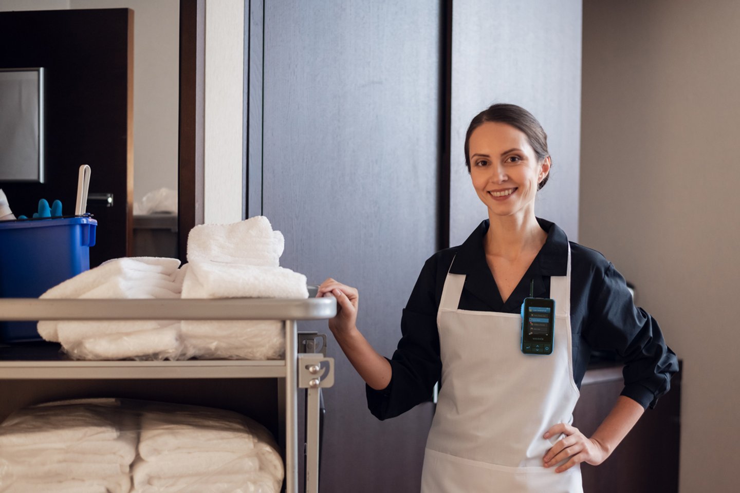 housekeeper with work radio for communication