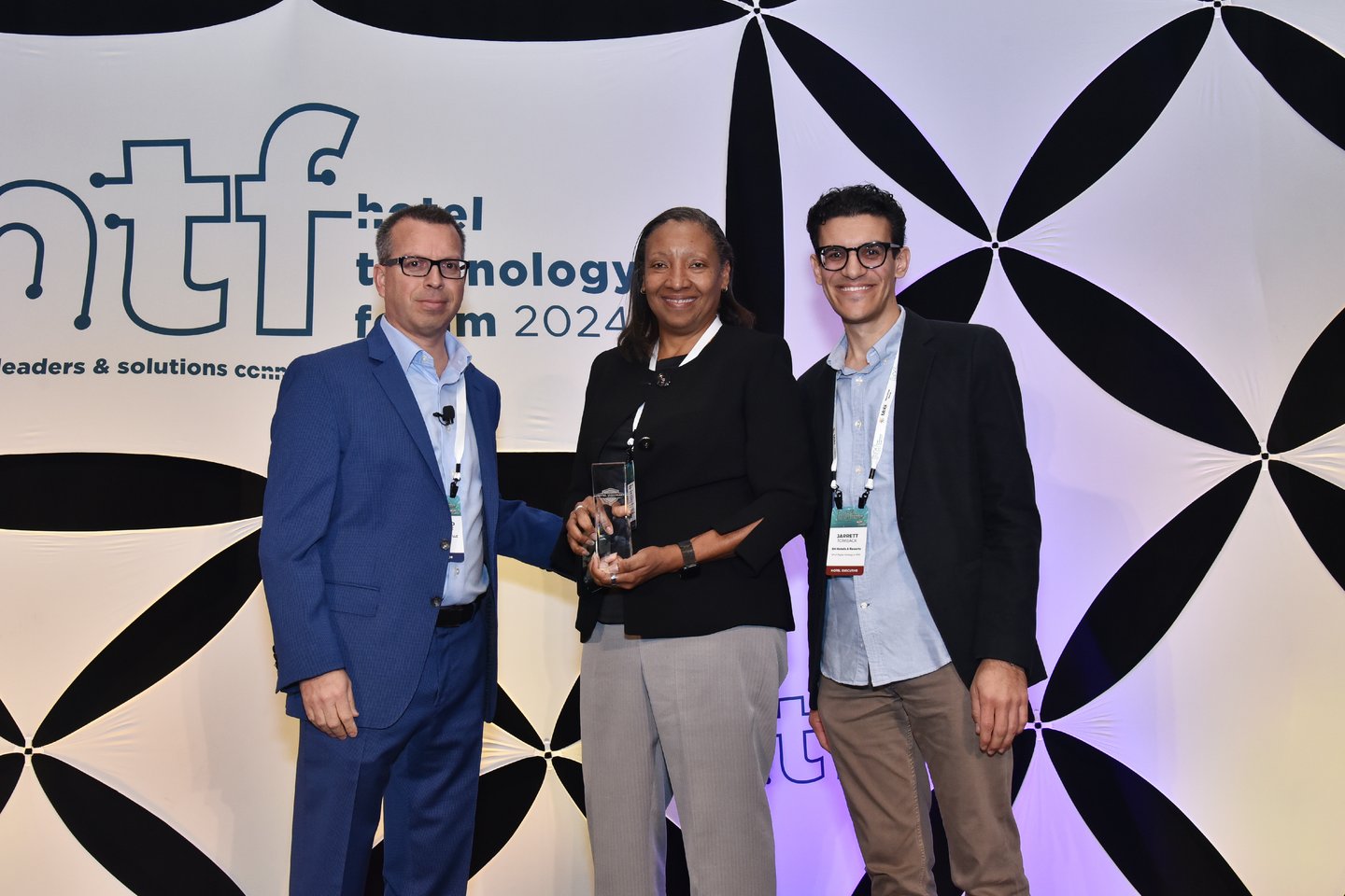 Denise Walker, CIO, SH Hotels & Resorts accepts a Visionary Award at HTF