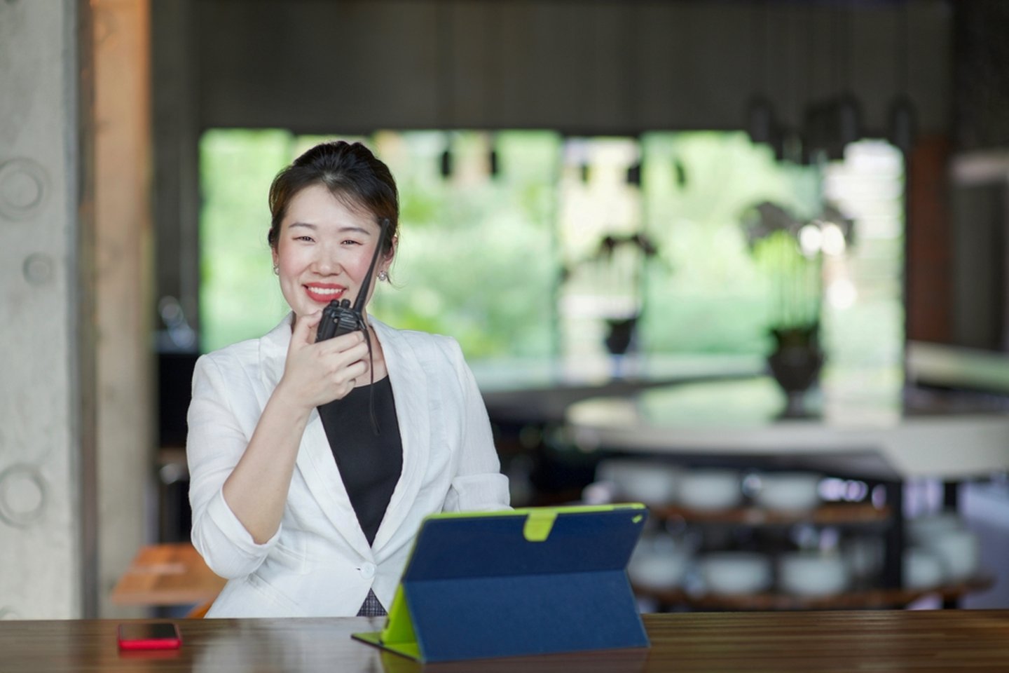 hotel staff member using radio