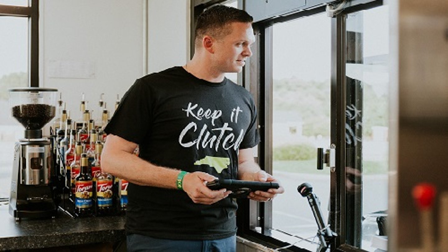 Darren Spicer Co-Founder Clutch Coffee working the drive-thru