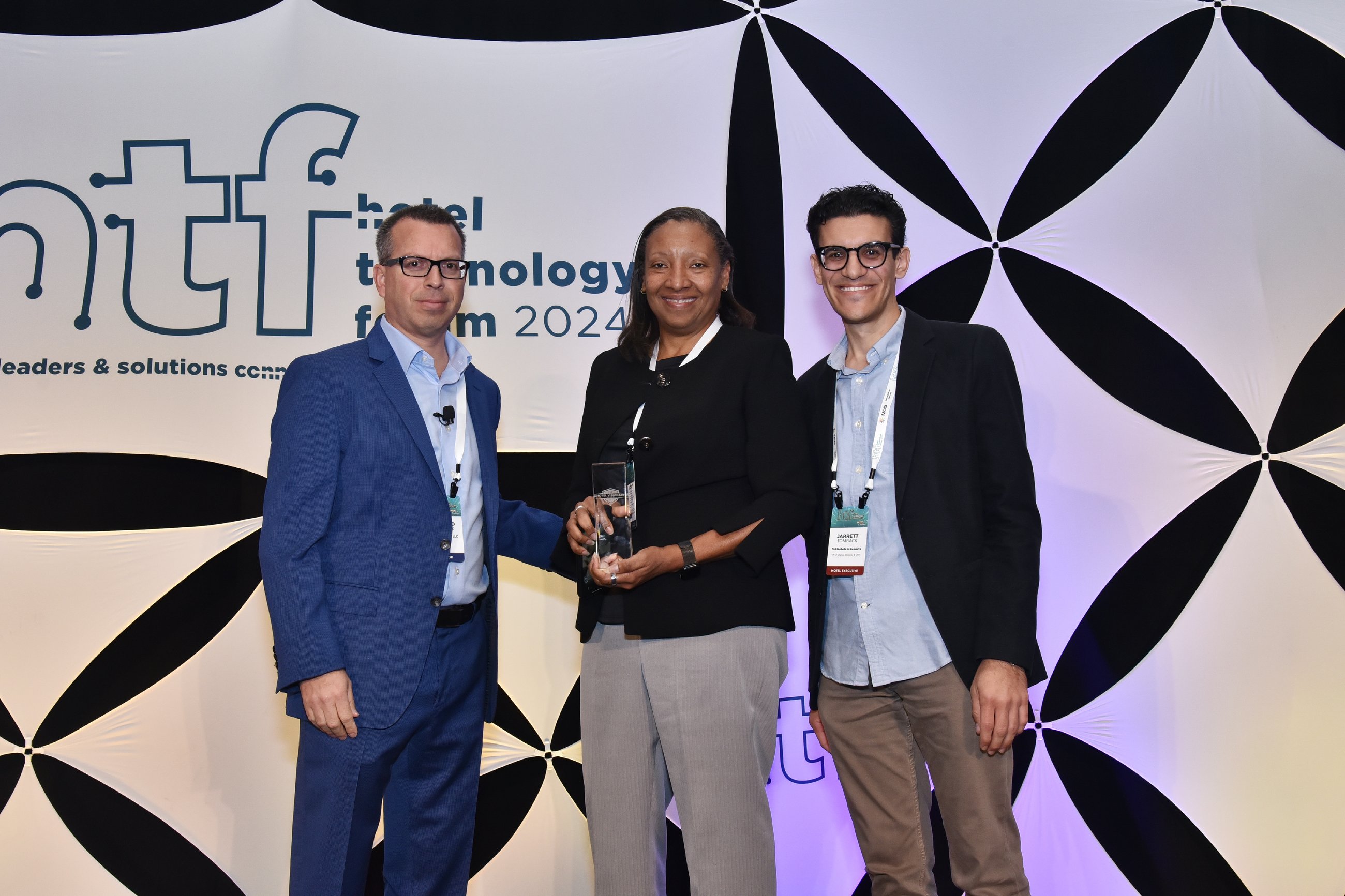 Denise Walker, CIO, SH Hotels & Resorts accepts a Visionary Award at HTF