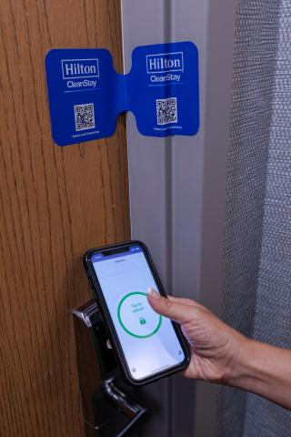 a hand holding a cellphone