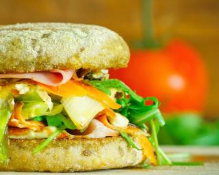 a close up of a sandwich sitting on top of a table