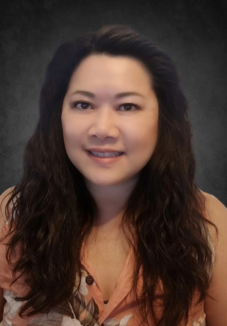 a woman smiling for the camera
