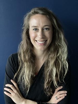 a woman smiling for the camera