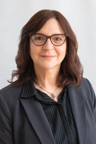 a woman wearing glasses