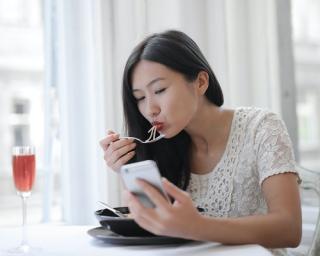 a woman sitting at a table