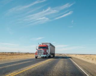 a truck that is driving down the road