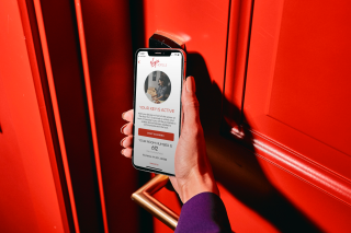 a hand holding a cellphone