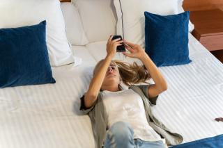 a woman lying on a bed