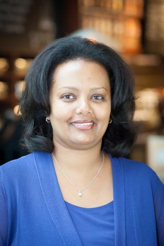 a woman wearing a blue shirt