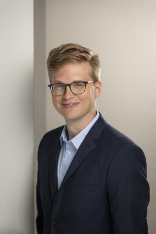 a man wearing a suit and tie