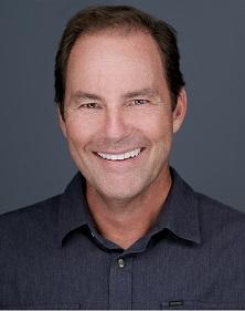 a man smiling for the camera