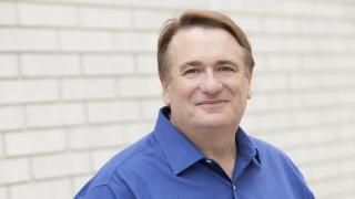 a man wearing a blue shirt