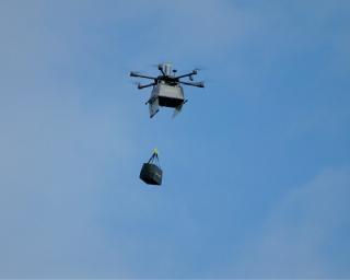 a large airplane flying high up in the air
