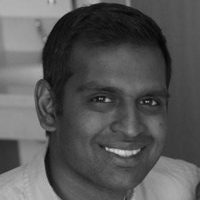 a man smiling for the camera