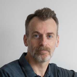 a man looking at the camera
