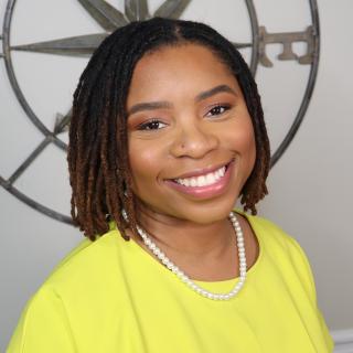 a woman smiling for the camera