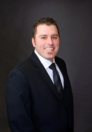a man wearing a suit and tie