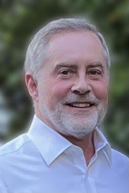 a man smiling for the camera
